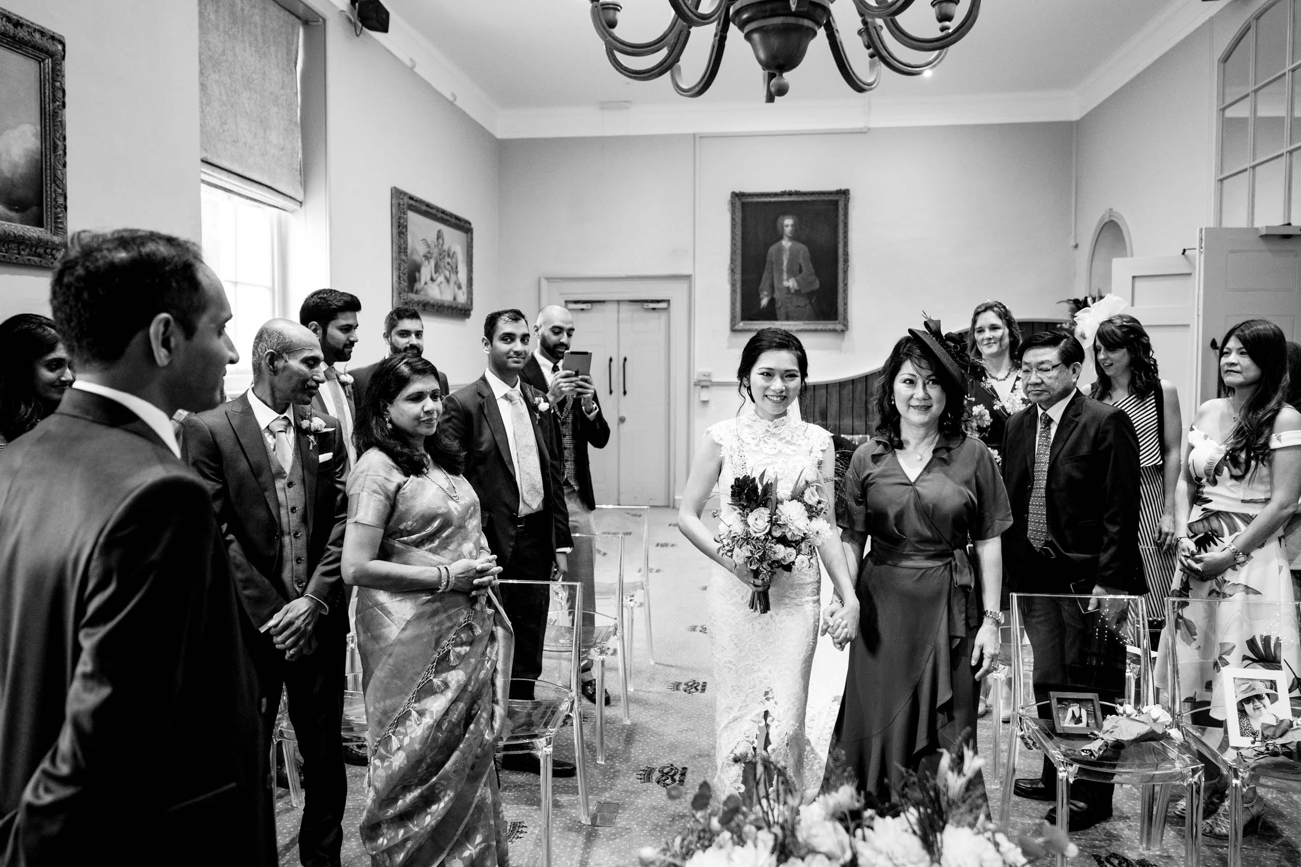 Bride walks down the aisle at her Chatsworth House wedding