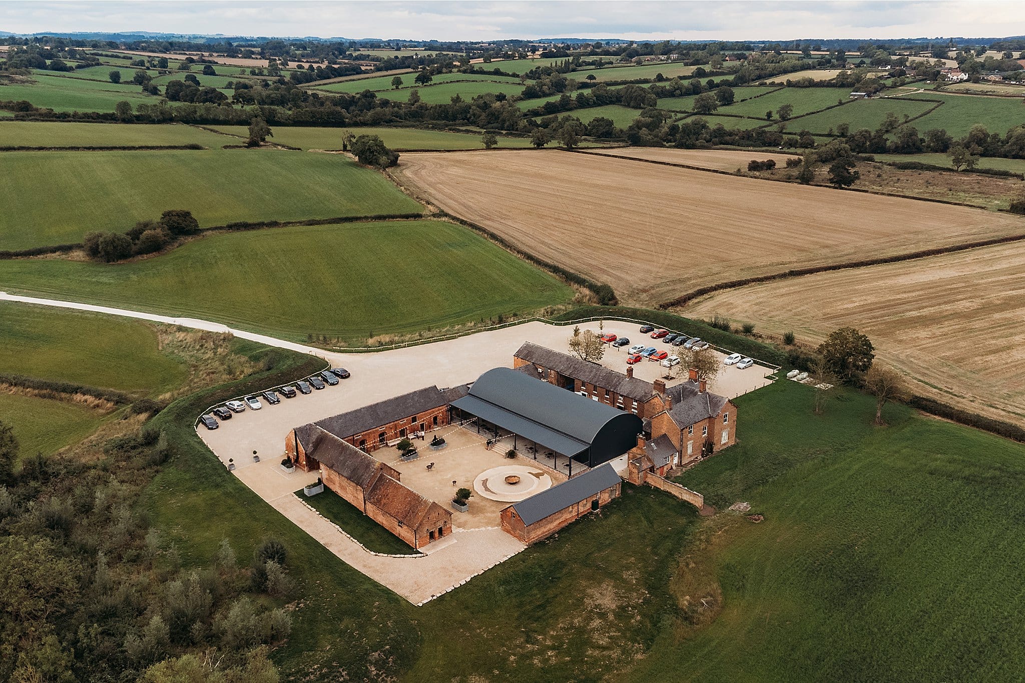 Aerial view of Grangefields wedding venue in Derbyshire from above using a drone