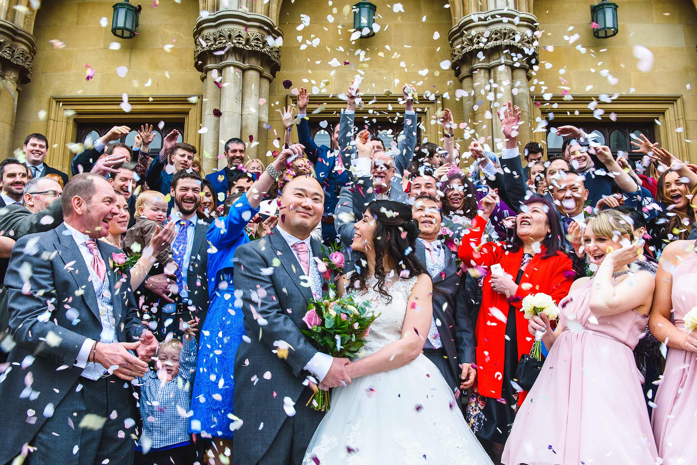 Wedding confetti covering bride & groom in Nottingham