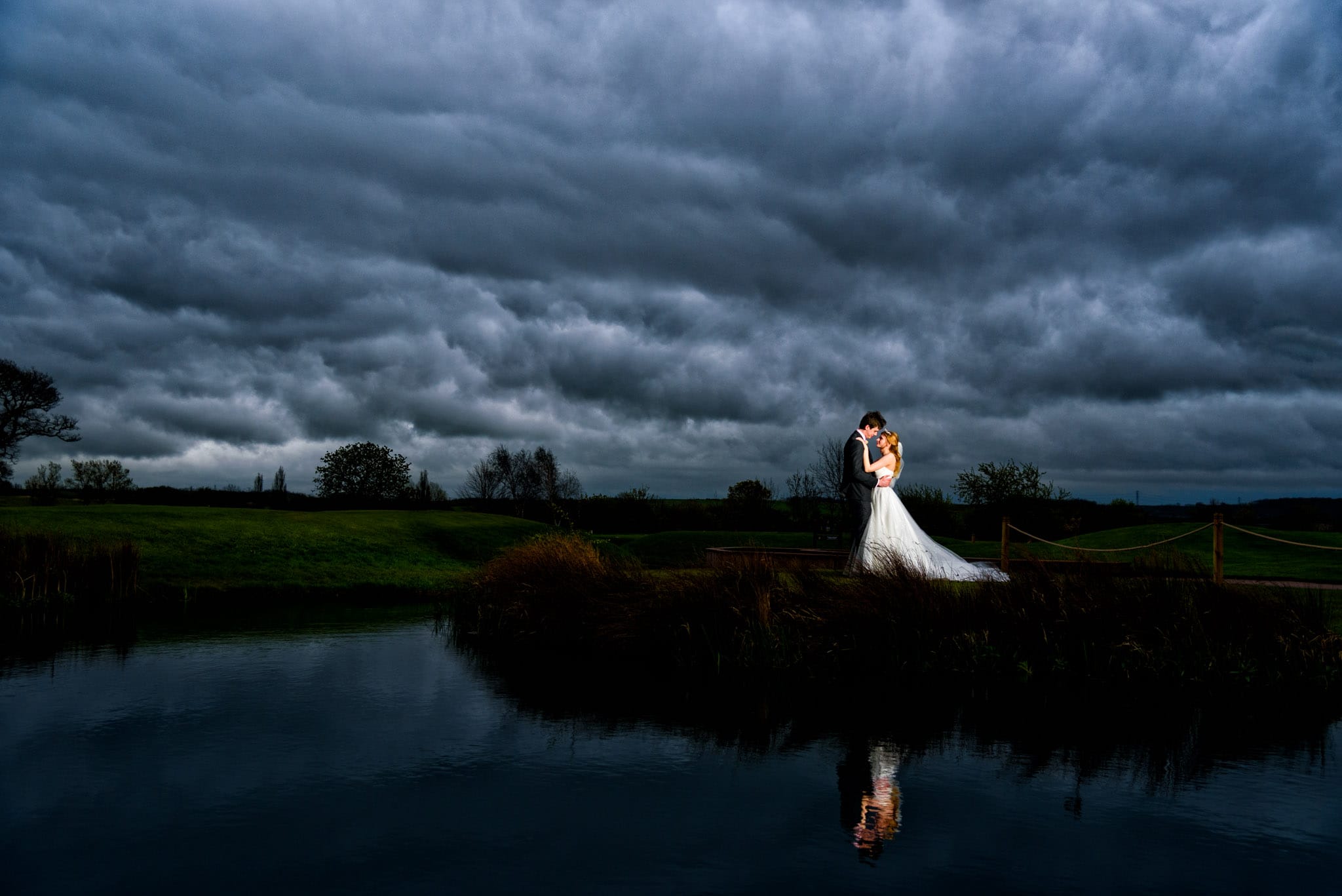 Bride & Groom at a rainy wedding at The Nottinghamshire