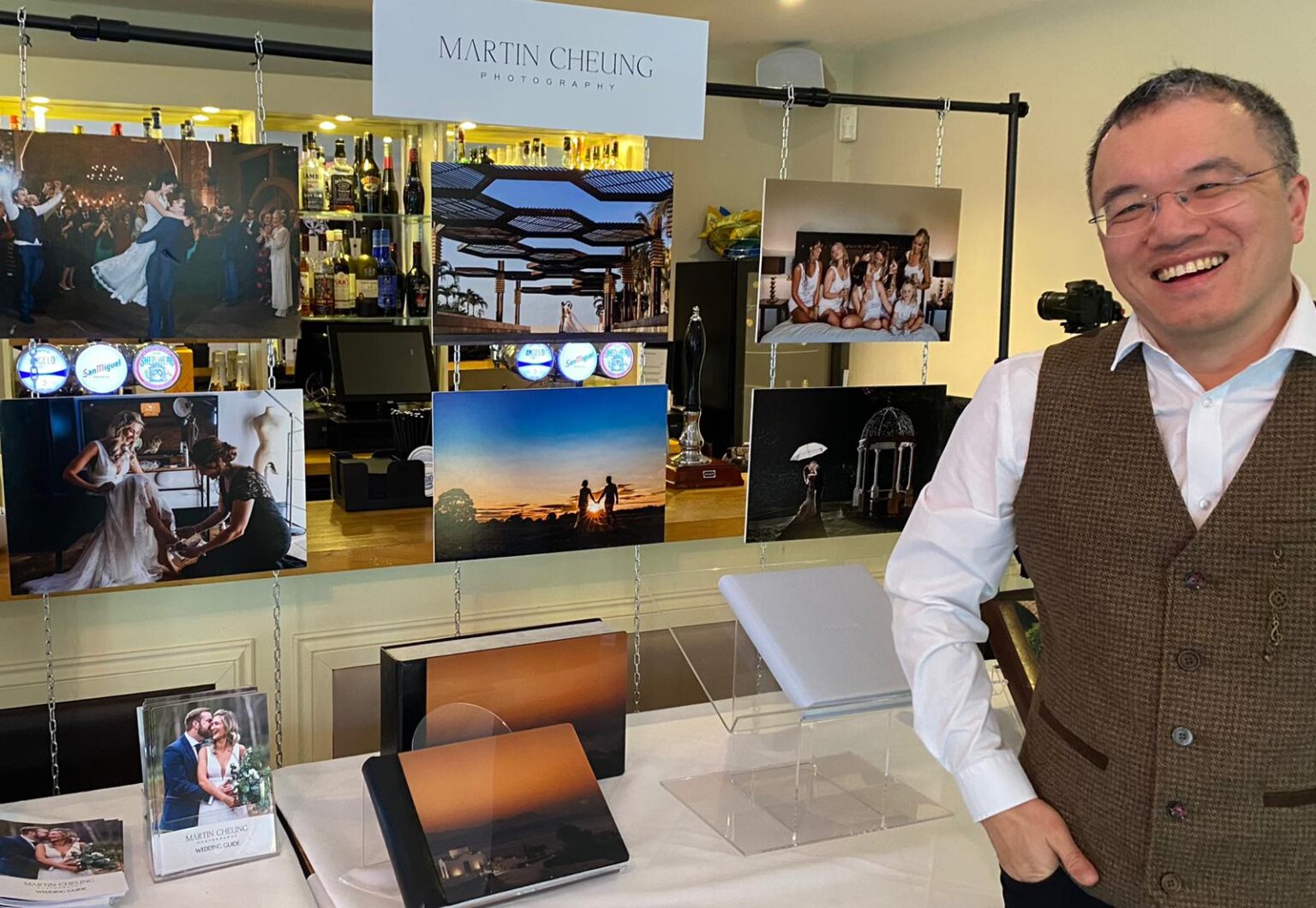 Me stood at a wedding fair with old display